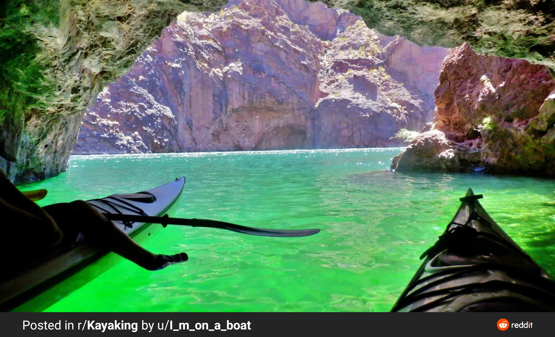Inside Emerald Cave — vivid emerald green water glow from inside the alcove, Colorado River, Black Canyon